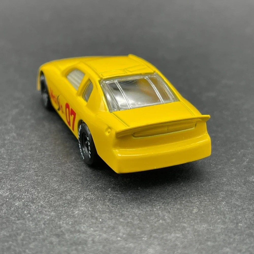 Maisto Chevrolet Chevy Monte Carlo Race Car #7 Yellow Diecast 1/64 Scale Loose